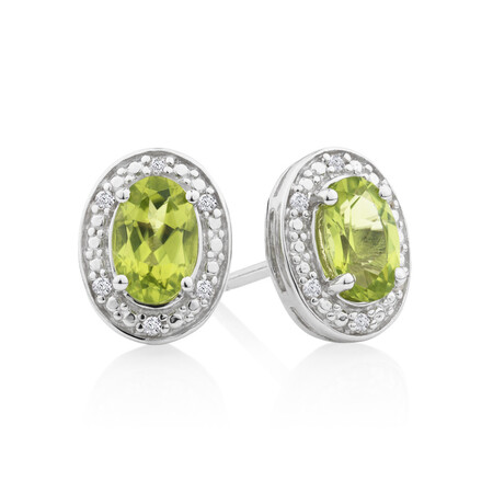 Halo Earrings with Peridot and 0.04 Carat TW of Diamonds in Sterling Silver Halo Earrings with Peridot and 0.04 Carat TW of Diamonds in Sterling Silver