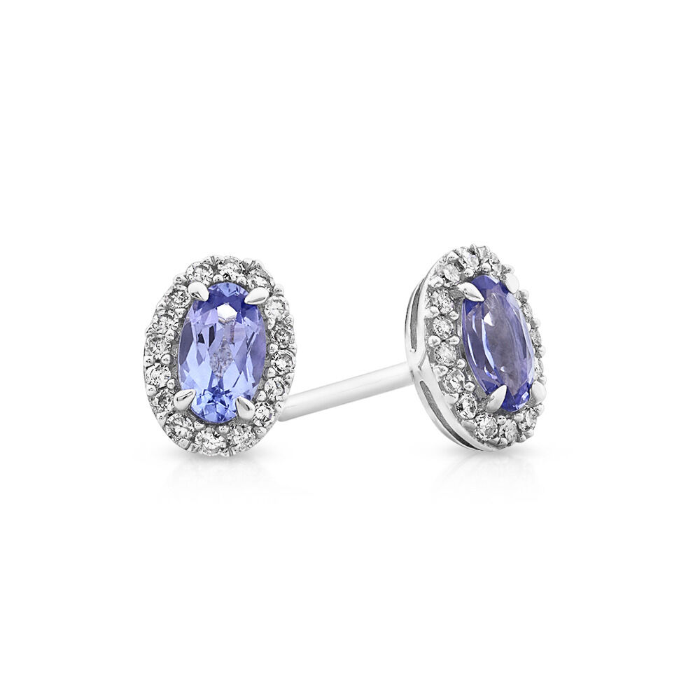 Halo Stud Earrings with Tanzanite 0.12 Carat TW Of Diamonds in 10kt White Gold