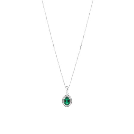 Halo Pendant with Created Emerald and 0.04 TW of Diamonds in Sterling Silver Halo Pendant with Created Emerald and 0.04 TW of Diamonds in Sterling Silver