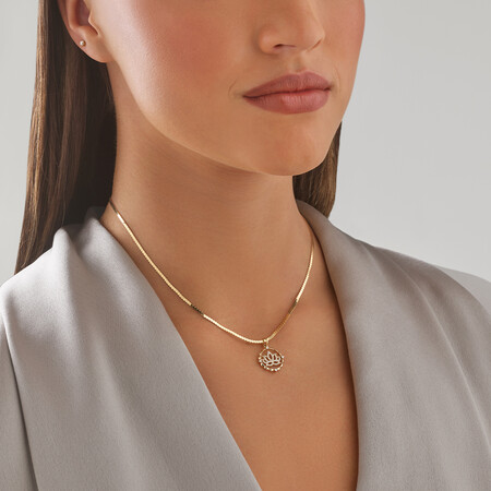 Lotus Motif Pendant with 0.15 Carat TW of Diamonds in 10kt Yellow Gold Lotus Motif Pendant with 0.15 Carat TW of Diamonds in 10kt Yellow Gold