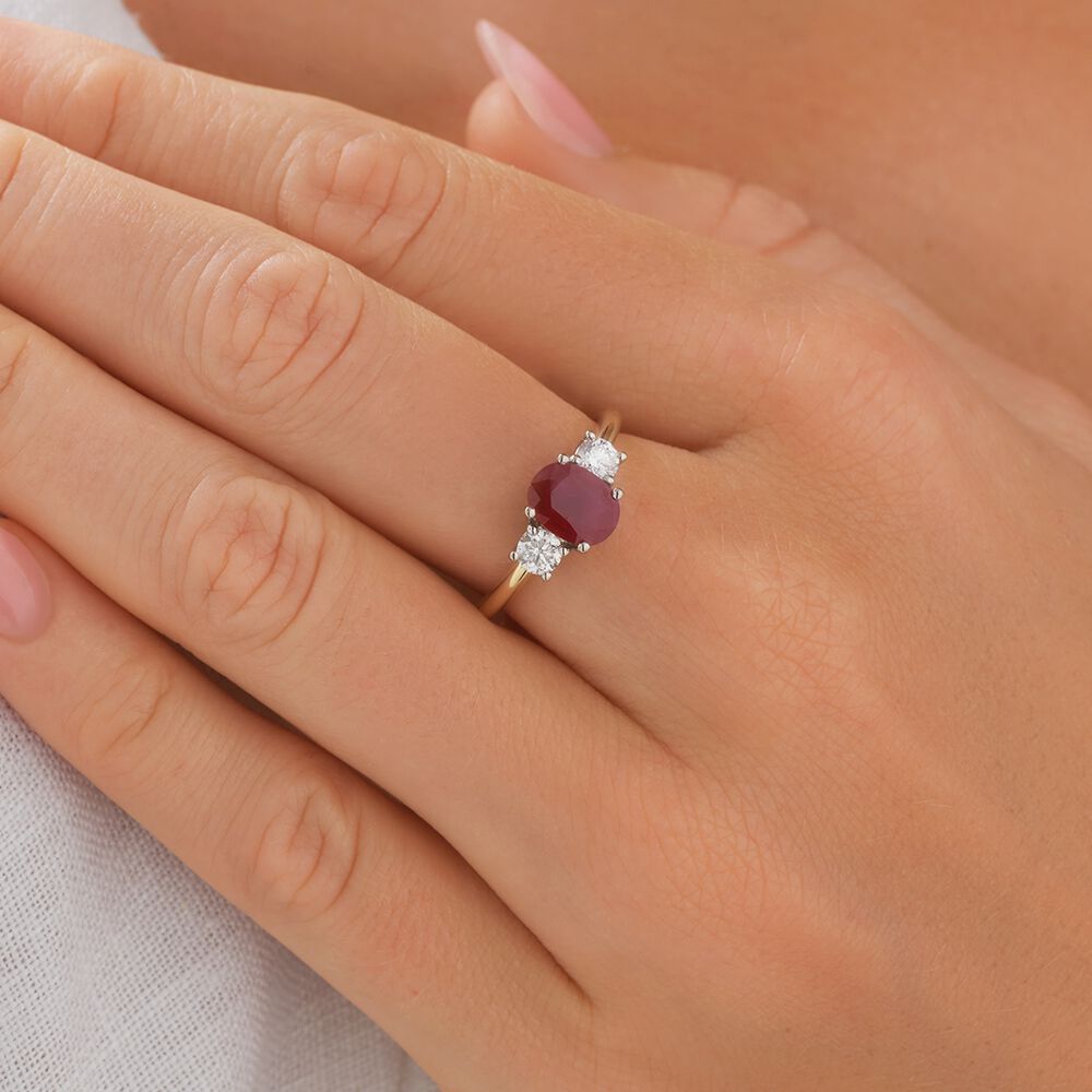 Oval ruby ring with diamonds sale