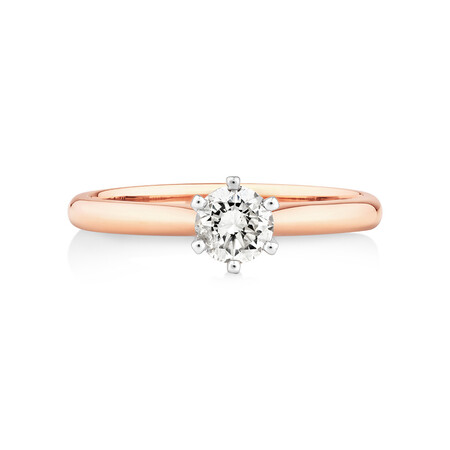 Certified Solitaire Engagement Ring with a 0.50 Carat TW Diamond in 18kt Rose and White Gold Certified Solitaire Engagement Ring with a 0.50 Carat TW Diamond in 18kt Rose and White Gold