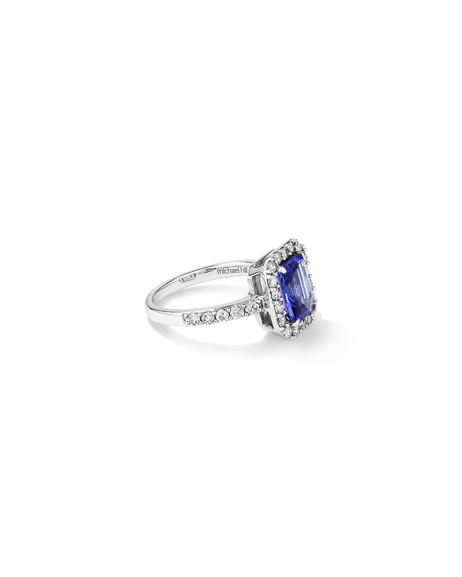Halo Ring with Tanzanite 0.75 Carat TW of Diamonds in 14kt White