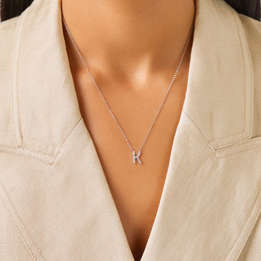 K' Initial necklace with 0.10 Carat TW 