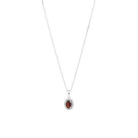 Halo Pendant with Garnet and 0.04 TW of Diamonds in Sterling Silver Halo Pendant with Garnet and 0.04 TW of Diamonds in Sterling Silver