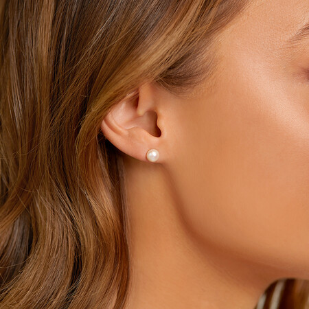 Stud Earrings with 6mm Button Cultured Freshwater Pearls in Sterling Silver Stud Earrings with 6mm Button Cultured Freshwater Pearls in Sterling Silver