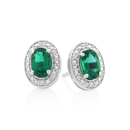 Halo Earrings with Created Emerald and 0.04 Carat TW of Diamonds in Sterling Silver Halo Earrings with Created Emerald and 0.04 Carat TW of Diamonds in Sterling Silver
