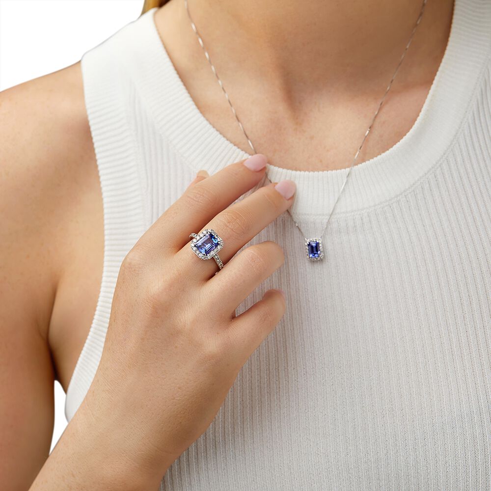 Halo Ring with Tanzanite 0.75 Carat TW of Diamonds in 14kt White