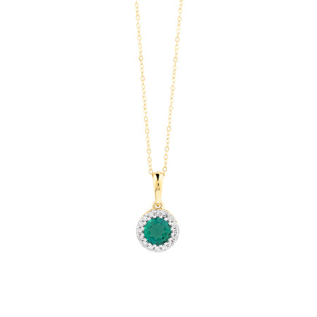 Halo Pendant with Laboratory Created Emerald & Natural Diamonds In 10kt Yellow Gold