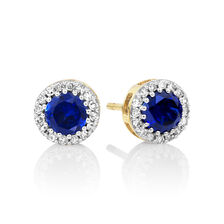Stud Earrings with Created Sapphire & .18 Carat TW of Diamonds in 10kt Yellow Gold