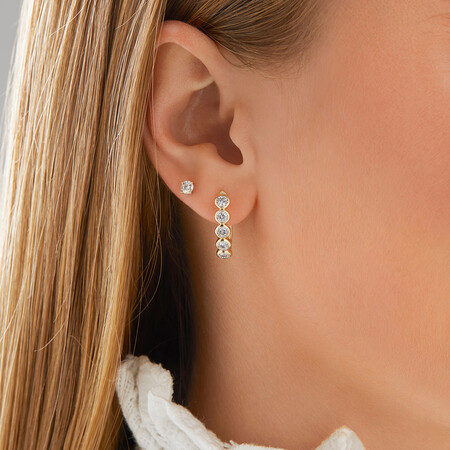 Huggie Earrings with 1/2 Carat TW of Diamonds in 10kt Yellow Gold Huggie Earrings with 1/2 Carat TW of Diamonds in 10kt Yellow Gold