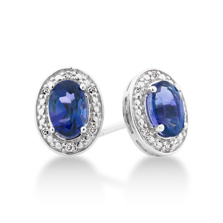 Halo Earrings with Created Blue Sapphire and 0.04 Carat TW of Diamonds in Sterling Silver Halo Earrings with Created Blue Sapphire and 0.04 Carat TW of Diamonds in Sterling Silver