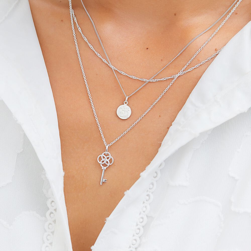 Aquarius Zodiac Pendant in Sterling Silver