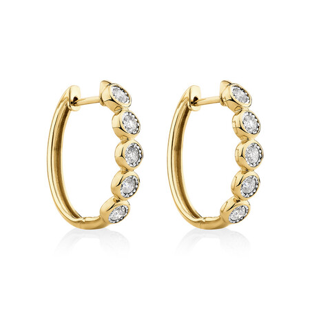Huggie Earrings with 1/2 Carat TW of Diamonds in 10kt Yellow Gold Huggie Earrings with 1/2 Carat TW of Diamonds in 10kt Yellow Gold