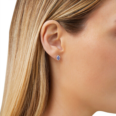 Halo Stud Earrings with Tanzanite & 0.12 Carat TW Of Diamonds in 10kt White Gold Halo Stud Earrings with Tanzanite & 0.12 Carat TW Of Diamonds in 10kt White Gold