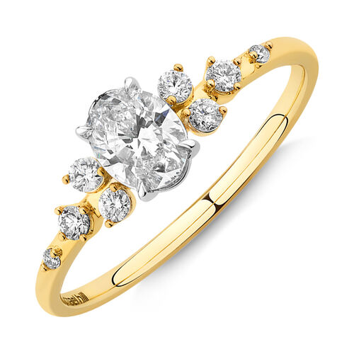 Oval Scatter Ring with 0.63 Carat TW of Diamonds in 14kt Yellow & White Gold.