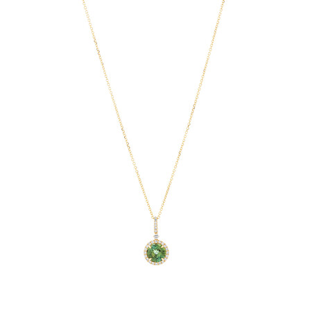 Halo Pendant with Green Tourmaline & 0.19 Carat TW of Diamonds in 14kt Yellow Gold