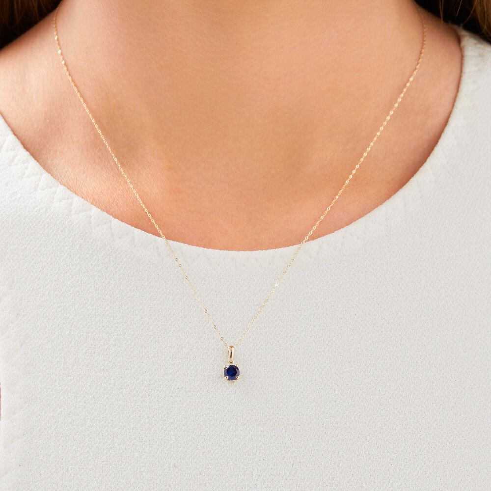 Pendant with Created Blue Sapphire in 10ct Yellow Gold
